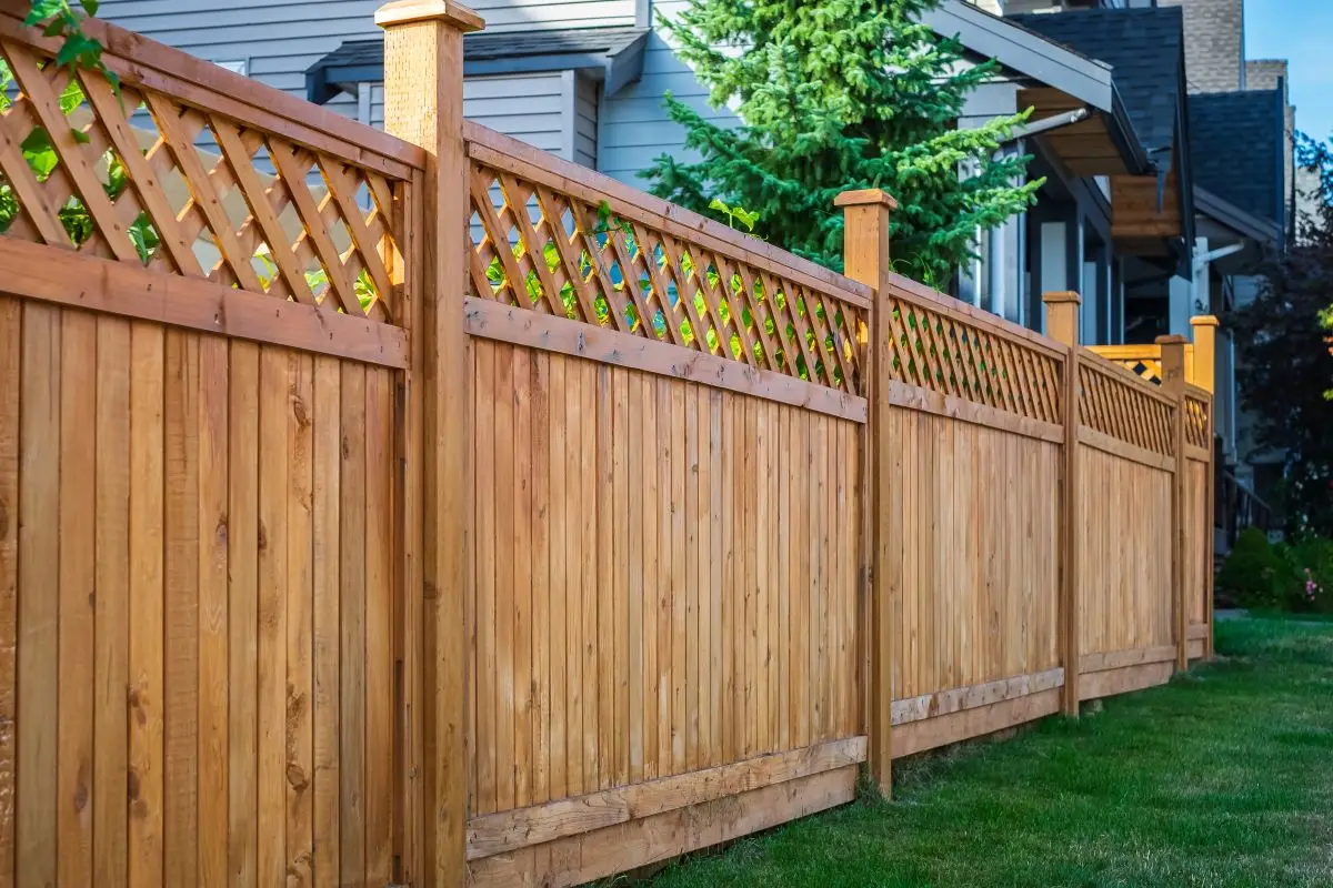 Nice new wooden fence around house
