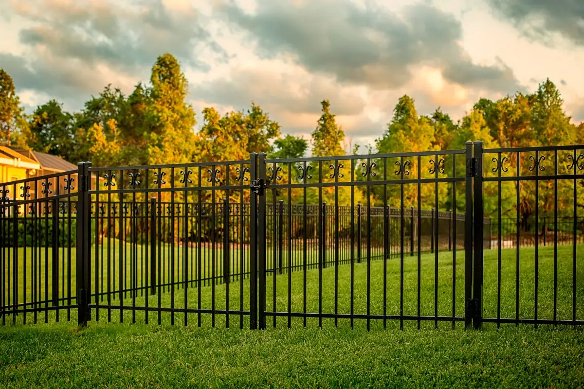 Ornamental black aluminum fence with double gates