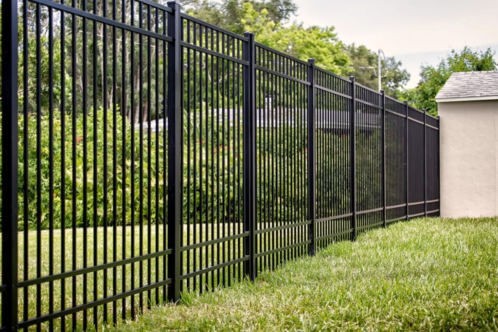 Black Aluminum Fence in a backyard