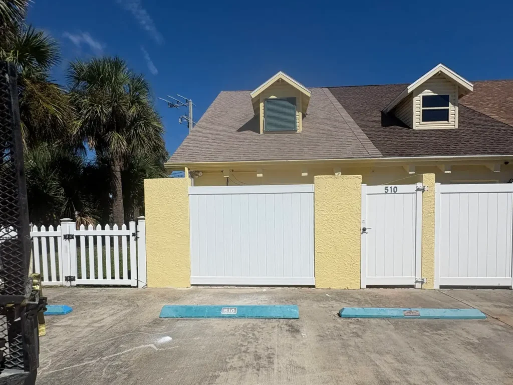 hoa approved fence yellow wall shingles roof