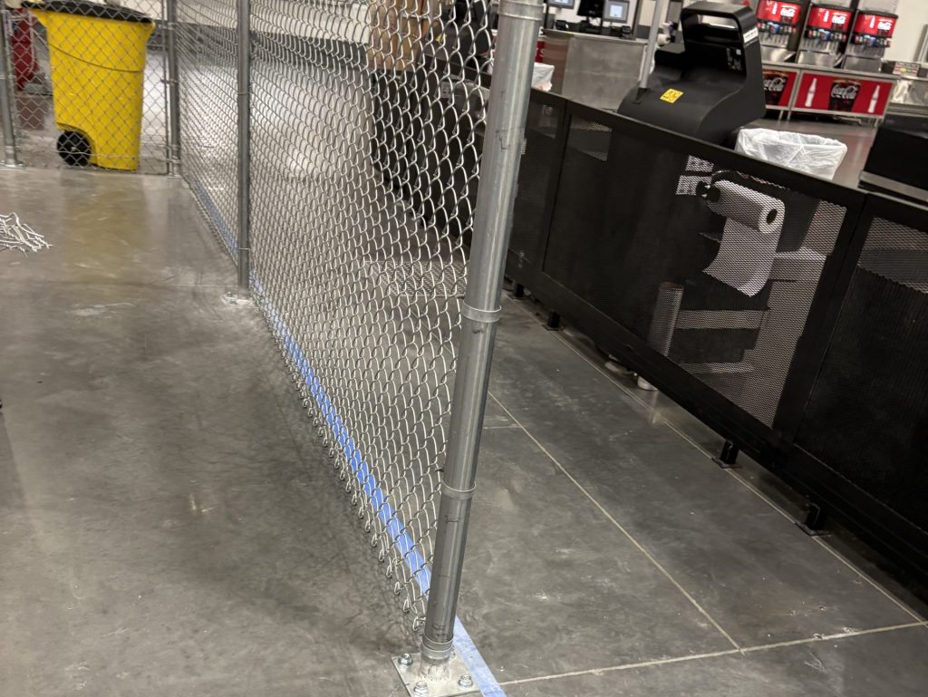 commercial chain link fence inside store