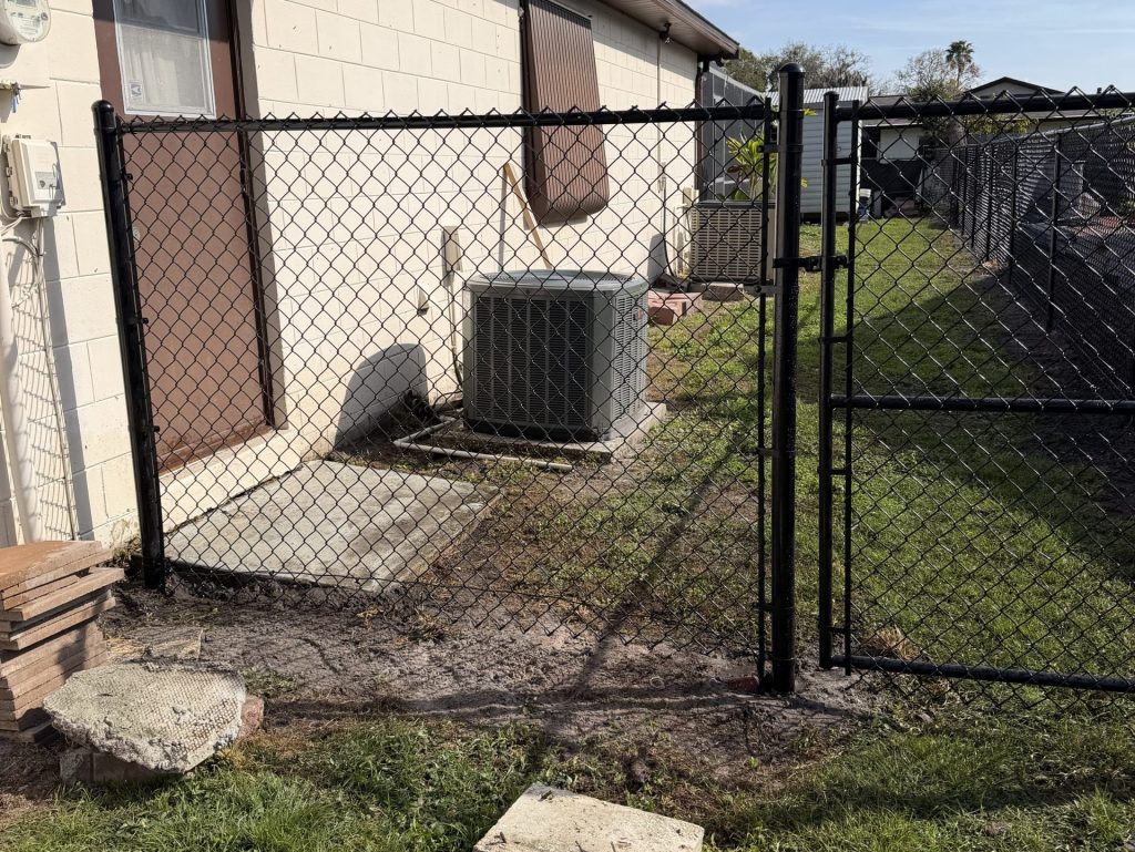 aluminum fence brown door beige wall