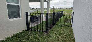 aluminum fence panels white and beige walls on each side