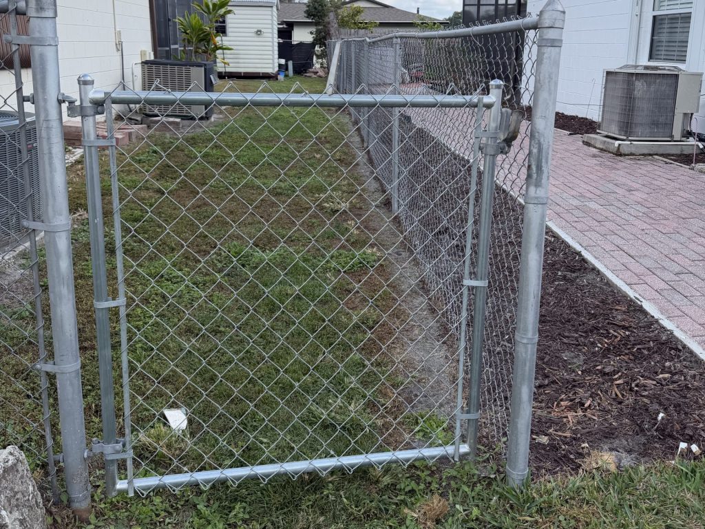 chain link fence cost grey fence white wall big house