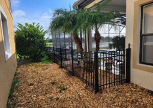 A fence surrounding a patio