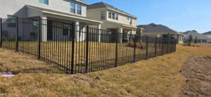 A professionally installed fence creates a clear and defined boundary around the property